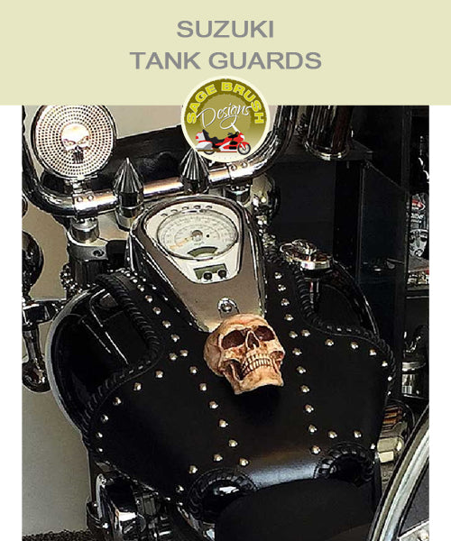 Suzuki Tank Guards with side lacing, studs, and custom skull ornament